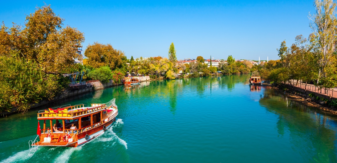 Tourist cruise boat at Manavgat river in Manavgat city centre in Antalya region in Turkey