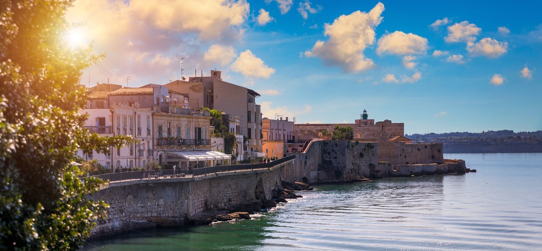 Siracusa, Ortigia Island, Sicily, Italy. Isola di Ortigia, coast of Ortigia island at city of Syracuse, Sicily, Italy. Coastline town Syracuse, Sicily and old Ortigia island.