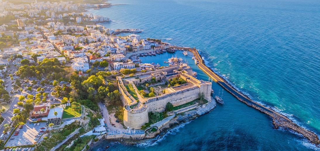 Aerial view of Historic Kyrenia Castle, marina harbour and port with yachts. Tarihi Girne Kalesi, Girne Kordonboyu. Northern Cyprus